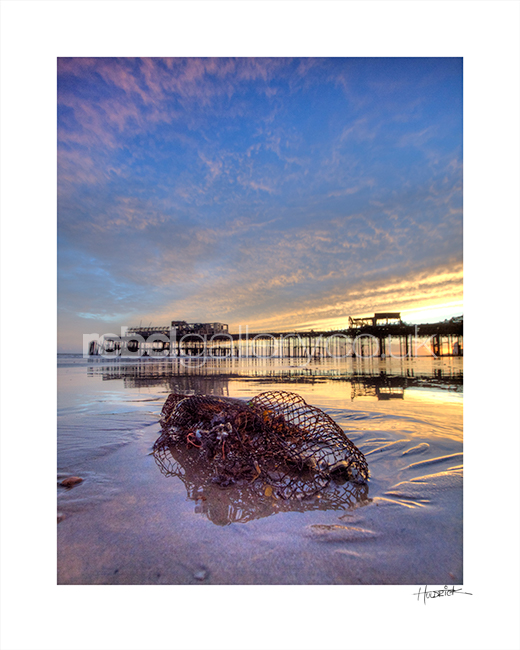 Photograph of Hastings Pier after the fire in 2010 by Hastings Photographer Jon "Huldrick' Wilhelm.