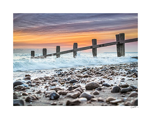 Photograph of sunset on St Leonards beach by Hastings photographer Jon Huldrick Wilhelm.