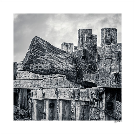 Photograph of wooden groynes on Winchelsea Beach by photographer Jon Huldrick Wilhelm.
