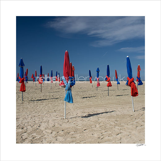 Photo of Beach umbrellas in Deauville France by Jon Huldrick Wilhelm.
